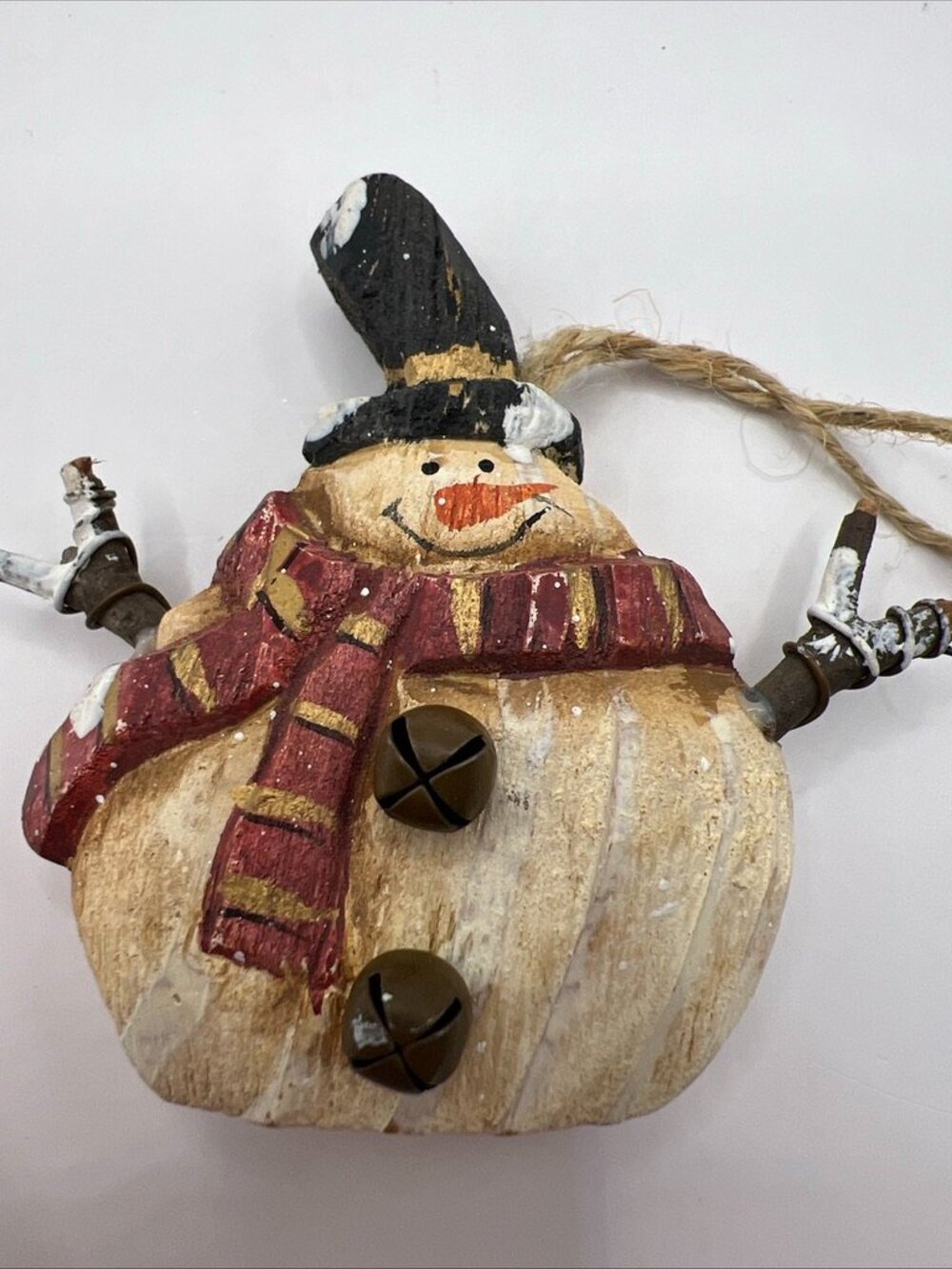 This Rustic Primitive Folk Art Snowman figurine is a charming addition to any Ch